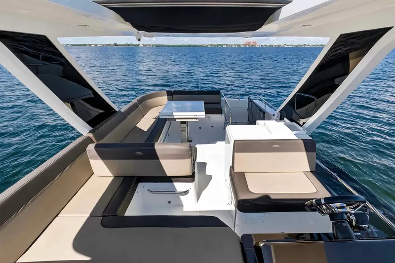 Slide: The Image of Luxurious 2021 Galeon 500 Fly yacht interior with elegant seating and ocean view. - 41