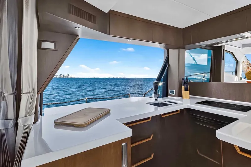 Slide: The Image of Luxurious 2021 Galeon 500 Fly yacht kitchen with ocean view and modern design. - 46