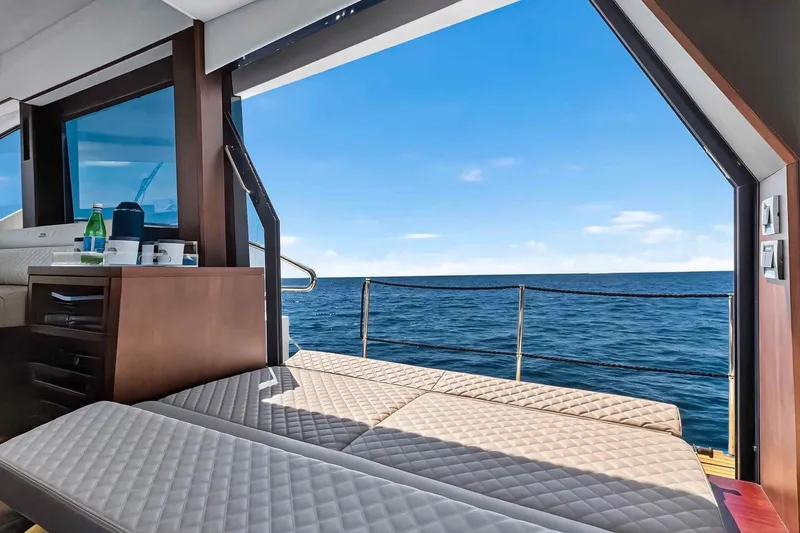 Slide: The Image of Luxurious 2021 Galeon 500 Fly yacht interior with ocean view and sunbathing area. - 47