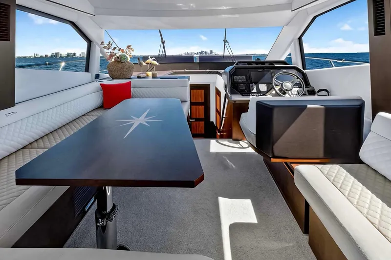 Slide: The Image of Luxurious interior of 2021 Galeon 500 Fly yacht with elegant seating and helm. - 50