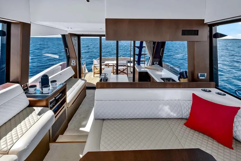 Slide: The Image of Luxurious interior of 2021 Galeon 500 Fly yacht with modern seating and ocean view. - 51