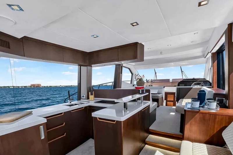 Slide: The Image of Luxurious interior of 2021 Galeon 500 Fly yacht with modern kitchen and ocean view. - 53