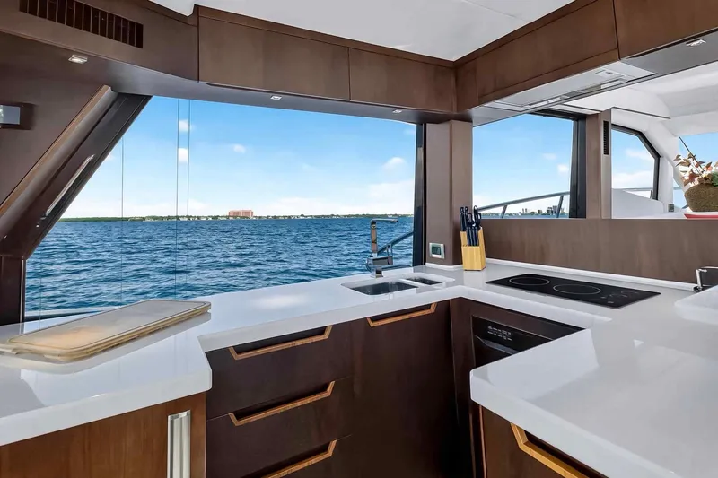 Slide: The Image of Luxurious kitchen interior of 2021 Galeon 500 Fly yacht with ocean view. - 57