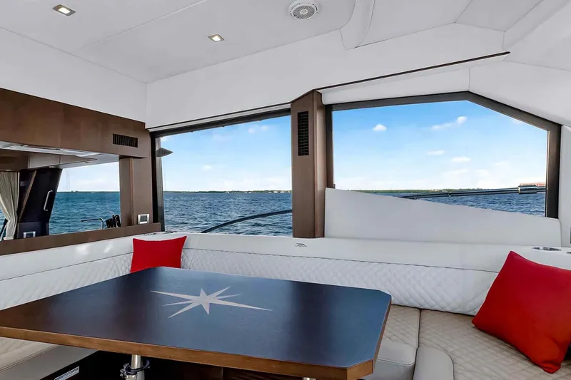 Slide: The Image of Luxurious interior of 2021 Galeon 500 Fly yacht with ocean view and modern seating. - 62