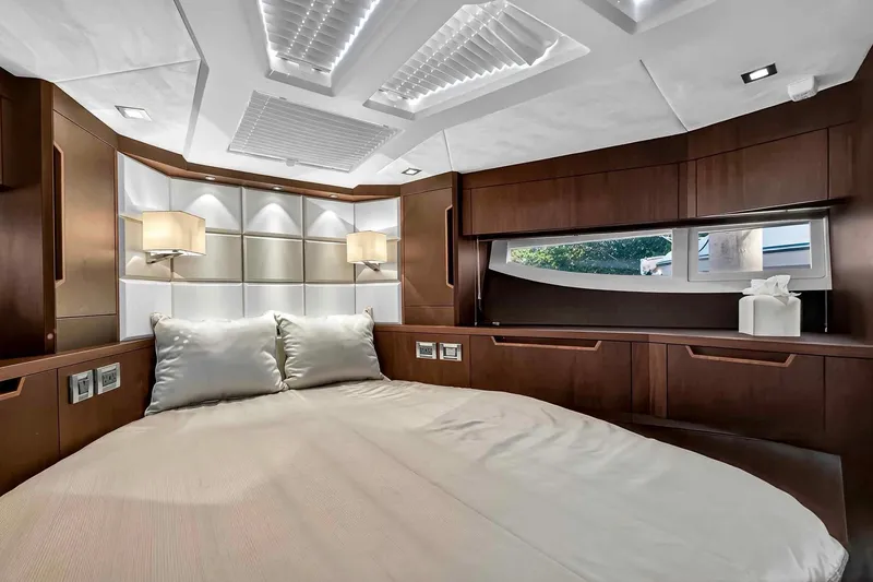 Slide: The Image of Luxurious bedroom interior of 2021 Galeon 500 Fly yacht with modern design elements. - 71