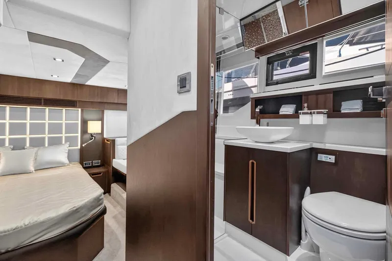 Slide: The Image of Luxurious interior of 2021 Galeon 500 Fly yacht featuring bedroom and modern bathroom. - 78