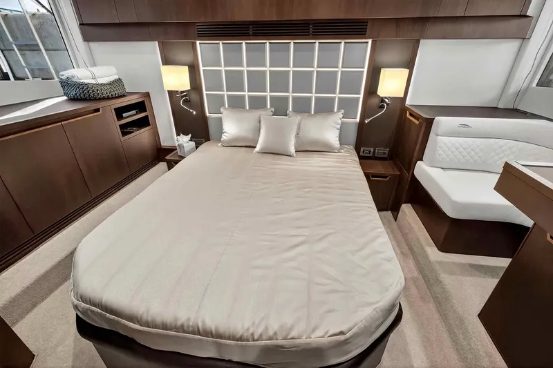 Slide: The Image of Luxurious bedroom interior of 2021 Galeon 500 Fly yacht with elegant furnishings. - 79