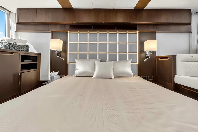 Slide: The Image of Luxurious bedroom interior of 2021 Galeon 500 Fly yacht with elegant wood finishes. - 87