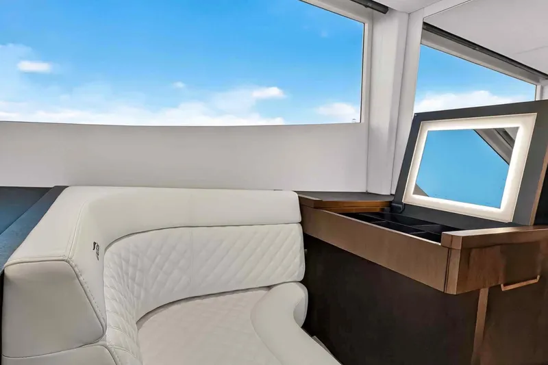 Slide: The Image of Luxurious interior of 2021 Galeon 500 Fly yacht with elegant seating and vanity. - 88