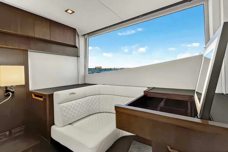 Slide: The Image of Luxurious interior of 2021 Galeon 500 Fly yacht with elegant seating and ocean view. - 89