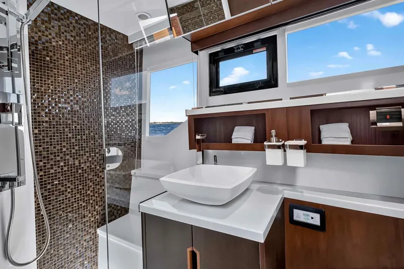 Slide: The Image of Luxurious bathroom interior of 2021 Galeon 500 Fly yacht with modern fixtures and ocean view. - 90