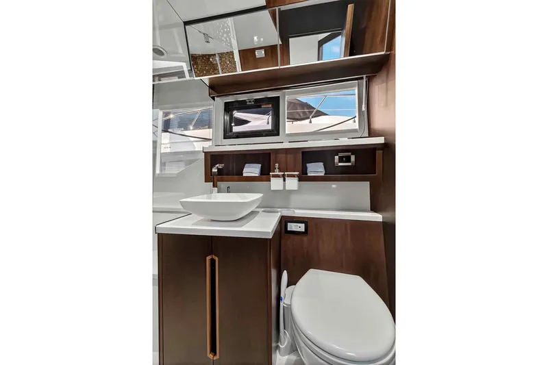 Slide: The Image of Luxurious bathroom interior of 2021 Galeon 500 Fly yacht, featuring modern fixtures and elegant design. - 92