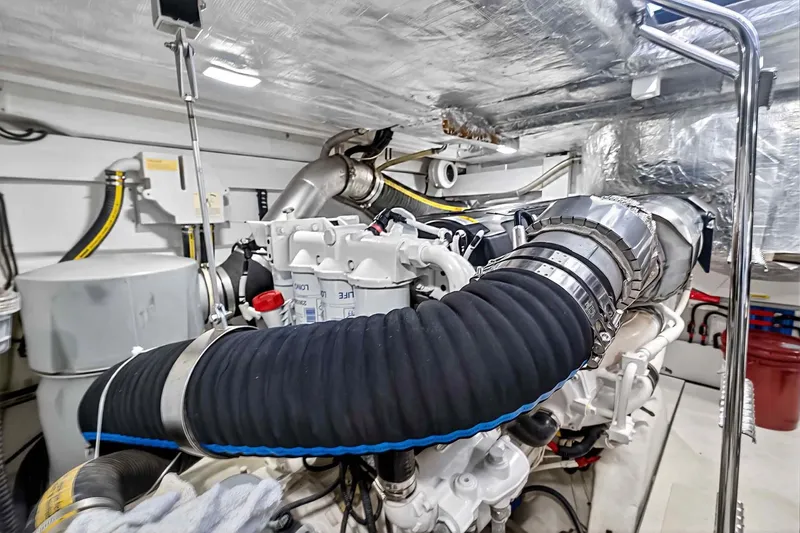 Slide: The Image of Engine room of 2021 Galeon 500 Fly yacht, showcasing complex machinery and components. - 95