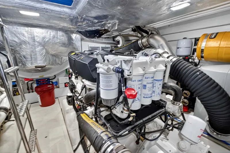 Slide: The Image of Engine room of 2021 Galeon 500 Fly yacht, featuring advanced mechanical systems. - 96
