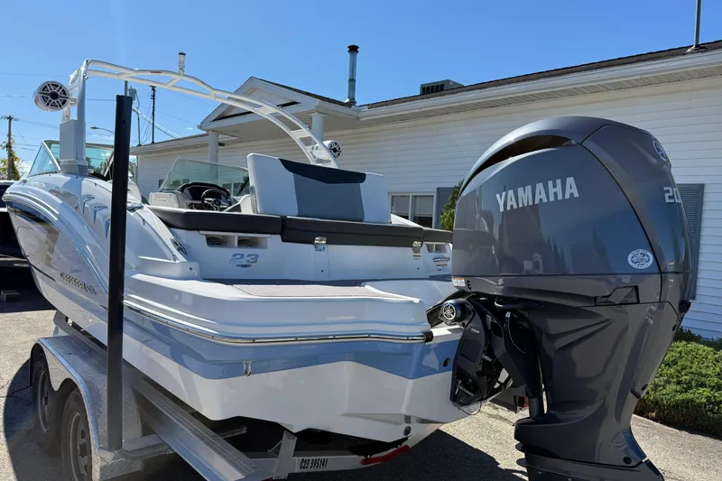Slide: The Image of 2024 Chaparral 23 SSi OB boat with Yamaha outboard motor on trailer. - 25