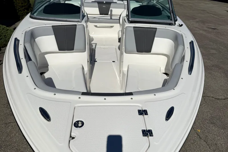 Slide: The Image of 2024 Chaparral 23 SSi OB boat interior with spacious seating and sleek design. - 28