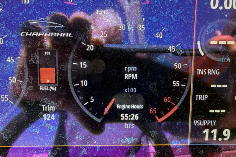 Slide: The Image of Dashboard of 2024 Chaparral 23 SSi OB showing RPM, fuel, and engine hours. - 4