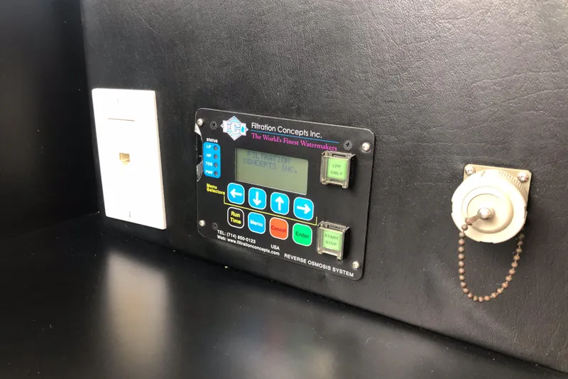 Slide: The Image of Control panel on 2003 Cape Horn Trawler, featuring various buttons and switches. - 22