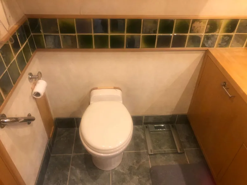 Slide: The Image of 2003 Cape Horn Trawler bathroom with tiled walls and modern fixtures. - 36