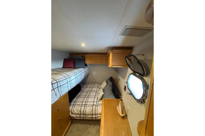Slide: The Image of Interior of 2003 Cape Horn Trawler with bunk beds and porthole window. - 40