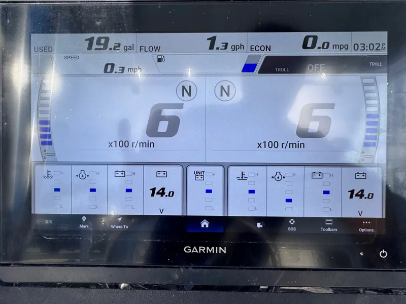 Slide: The Image of Garmin marine display showing fuel usage, speed, and engine RPM for Jupiter 30, 2008 model. - 24