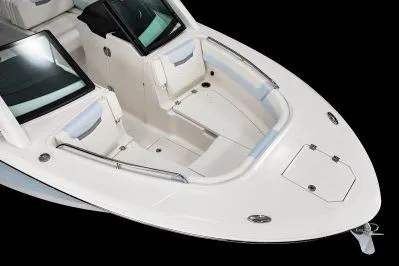 Slide: The Image of 2026 Robalo R257 Dual Console boat, sleek white design, spacious seating, modern features. - 24