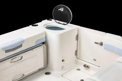 Slide: The Image of 2026 Robalo R257 Dual Console boat interior with storage and seating features. - 5