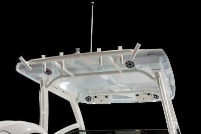 Slide: The Image of 2026 Robalo R257 Dual Console boat top with rod holders and speakers. - 8