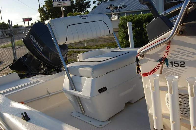 Slide: The Image of 2006 KEYWEST 152 boat interior with Yamaha engine and seating. - 12