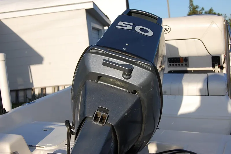 Slide: The Image of 2006 KEYWEST 152 boat with a 50 HP outboard motor, rear view. - 8