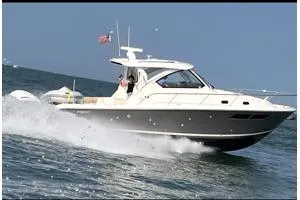 The Image of 2021 Pursuit OS 355 Offshore boat cruising on open water. - 0