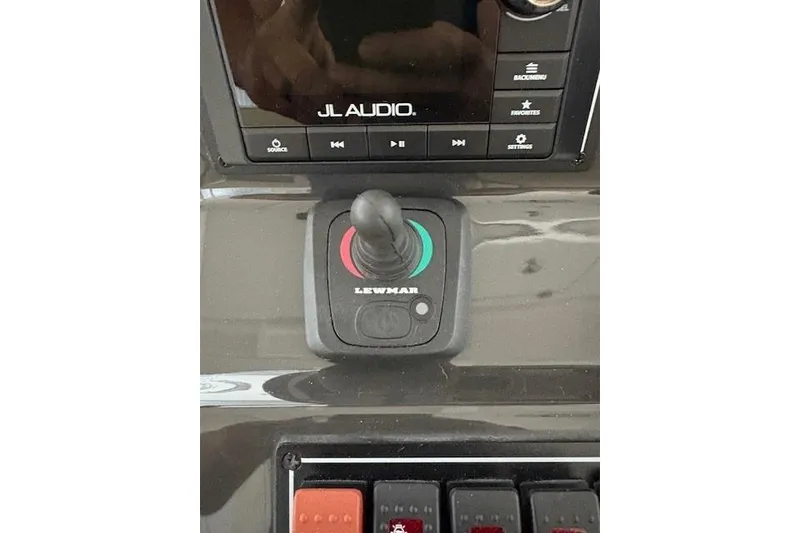 Slide: The Image of Joystick control on 2021 Pursuit OS 355 Offshore boat, featuring Yamaha branding. - 34