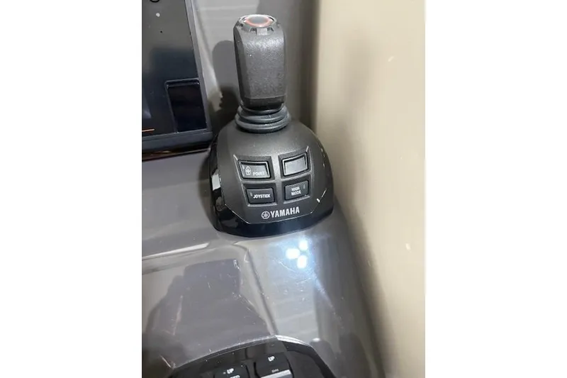 Slide: The Image of Joystick control on 2021 Pursuit OS 355 Offshore boat, featuring Yamaha branding. - 40