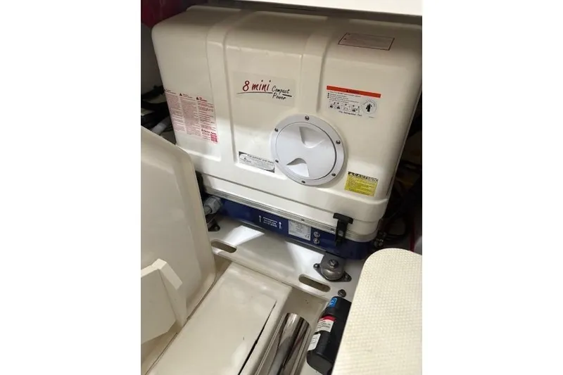 Slide: The Image of 2021 Pursuit OS 355 Offshore engine compartment with 8 Mini Compact Power unit. - 42