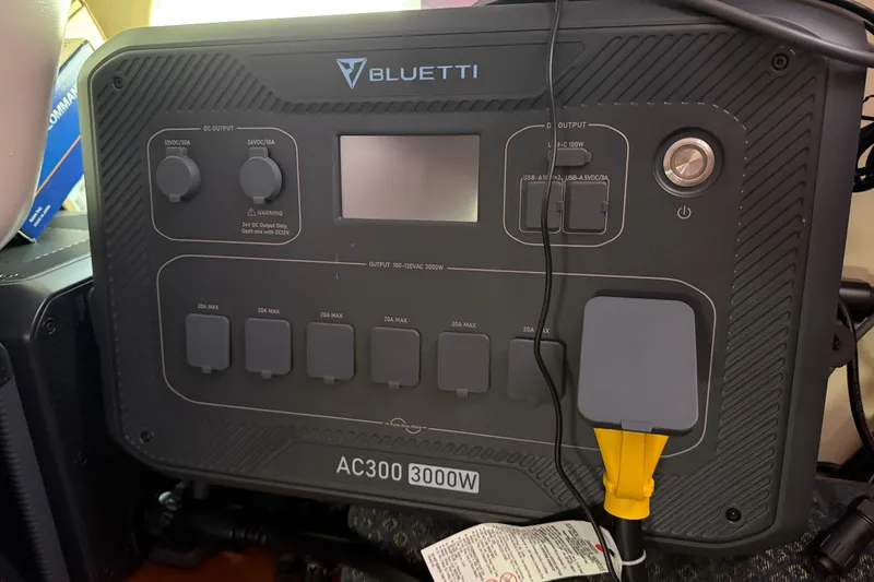 Slide: The Image of Bluetti AC300 3000W power station with multiple output ports and display screen. - 22