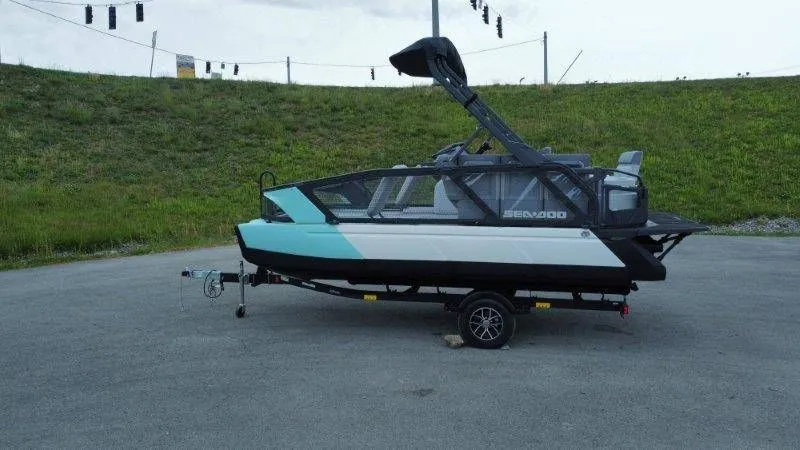 Slide: The Image of 2026 Sea-Doo Switch Sport 18 on trailer, side view. - 17