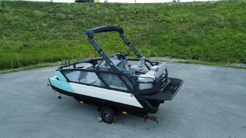 Slide: The Image of 2026 Sea-Doo Switch Sport 18 on trailer, side view. - 18