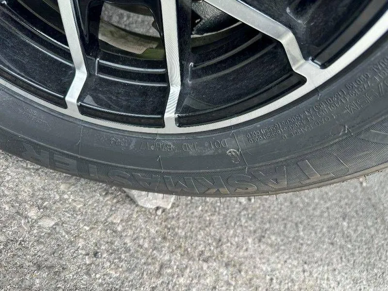 Slide: The Image of Close-up of a tire on asphalt, Sea-Doo Switch Sport 18, 2026. - 22