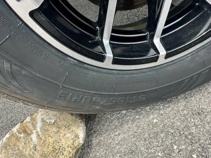Slide: The Image of Close-up of a tire on a 2026 Sea-Doo Switch Sport 18. - 25