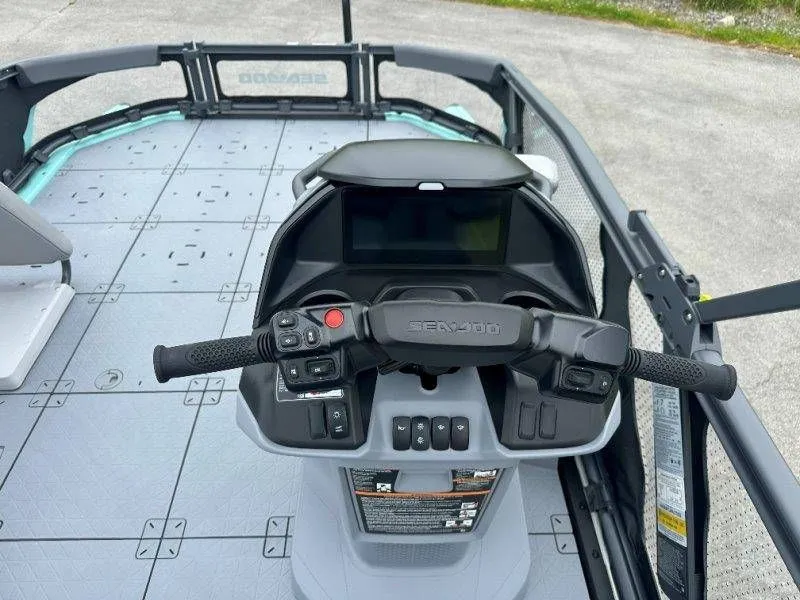 Slide: The Image of 2026 Sea-Doo Switch Sport 18 console on gray deck. - 26