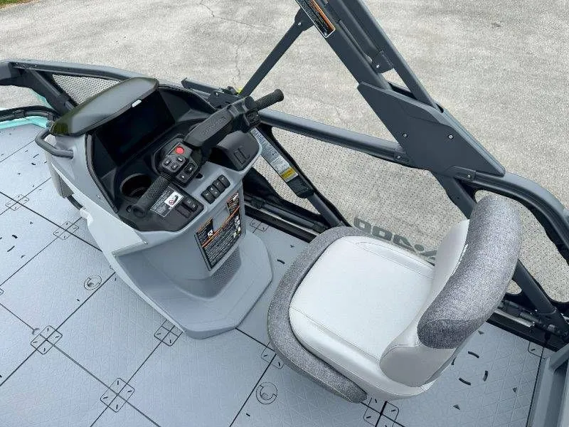 Slide: The Image of Interior of 2026 Sea-Doo Switch Sport 18, steering console and seat. - 27