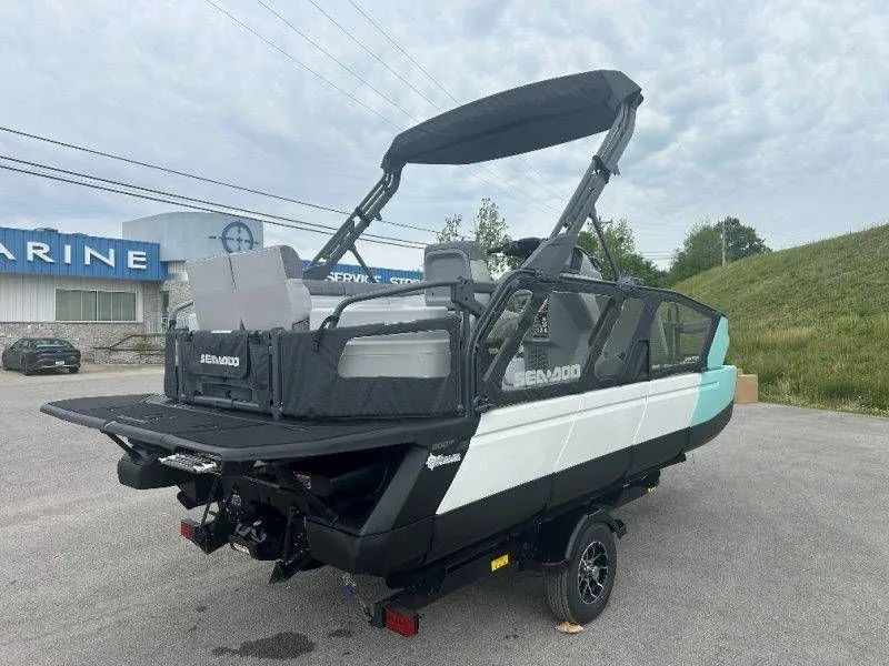 Slide: The Image of 2026 Sea-Doo Switch Sport 18 on trailer, parked outdoors. - 38