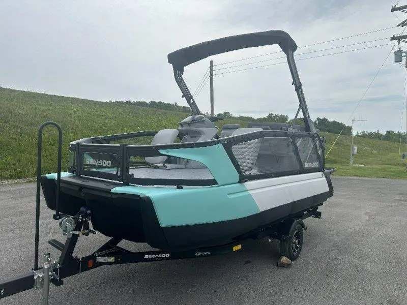 Slide: The Image of 2026 Sea-Doo Switch Sport 18 on trailer, green and black. - 42
