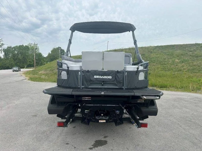 Slide: The Image of Rear view of 2026 Sea-Doo Switch Sport 18 on a road. - 43