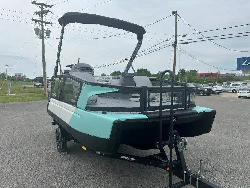 Slide: The Image of 2026 Sea-Doo Switch Sport 18 on trailer, parking lot in background. - 44