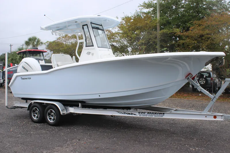 The Image of 2026 Tidewater 232 LXF boat on trailer, side view, outdoors. - 1