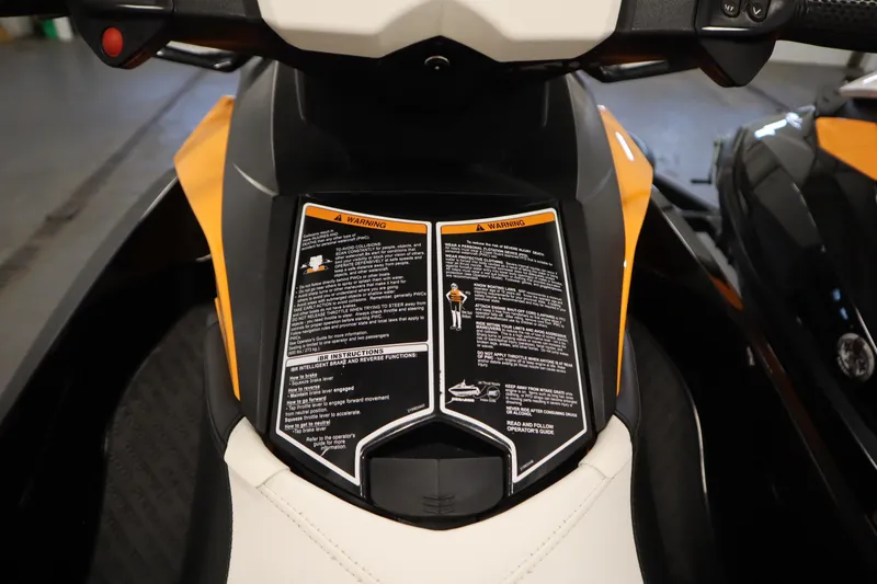Slide: The Image of 2012 Sea-Doo GTR 215 dashboard with warning labels and controls. - 13