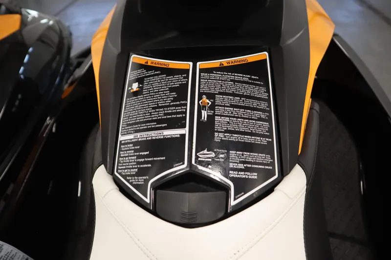 Slide: The Image of 2012 Sea-Doo GTR 215 dashboard with safety instructions and warnings. - 28