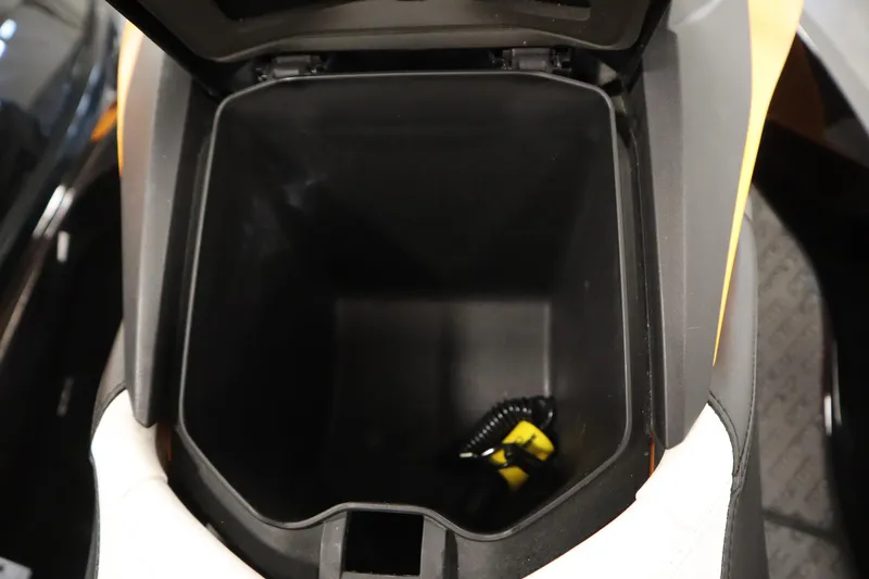 Slide: The Image of 2012 Sea-Doo GTR 215 storage compartment, open and empty, with visible interior details. - 29