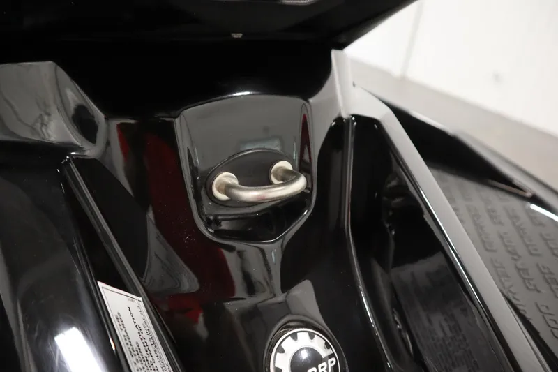Slide: The Image of Close-up of a 2012 Sea-Doo GTR 215 jet ski's black body and metal handle. - 32